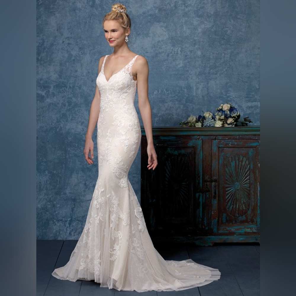 Wedding dress style BL245 from Beloved by Casablanca in size 12 and Ivory color